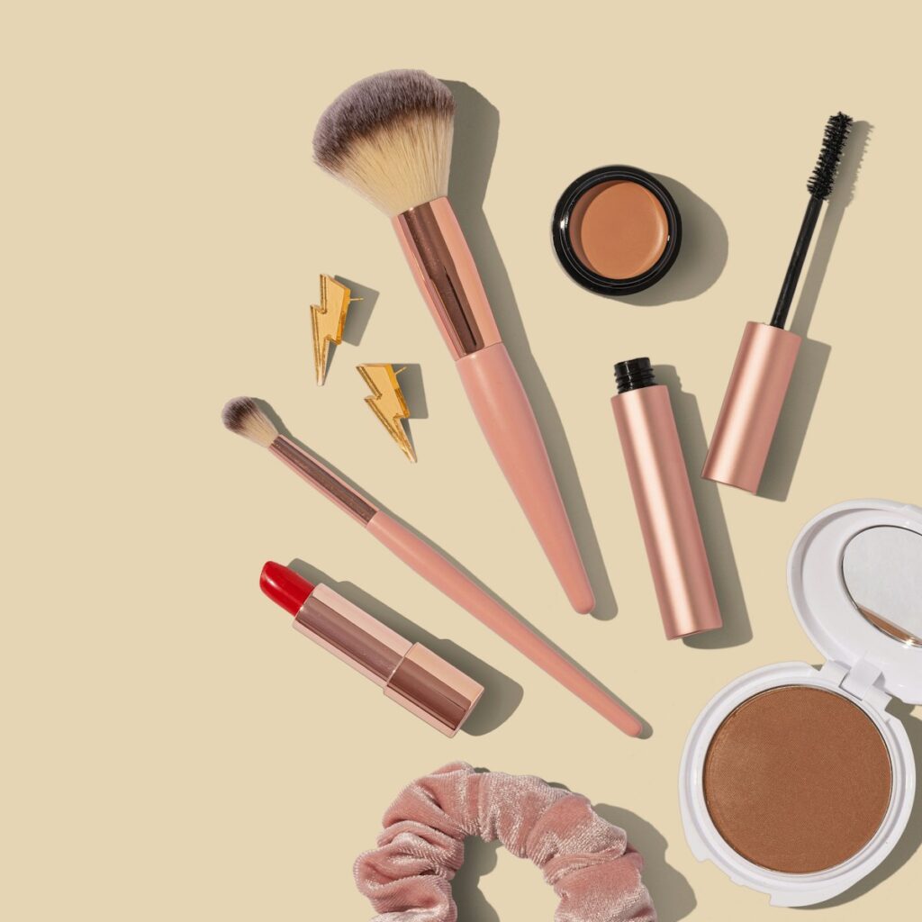 Professional makeup palette and brushes ready for a client session