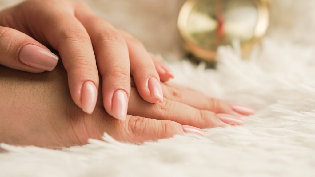Manicurist giving a professional manicure at The Beauty Loft Bucharest